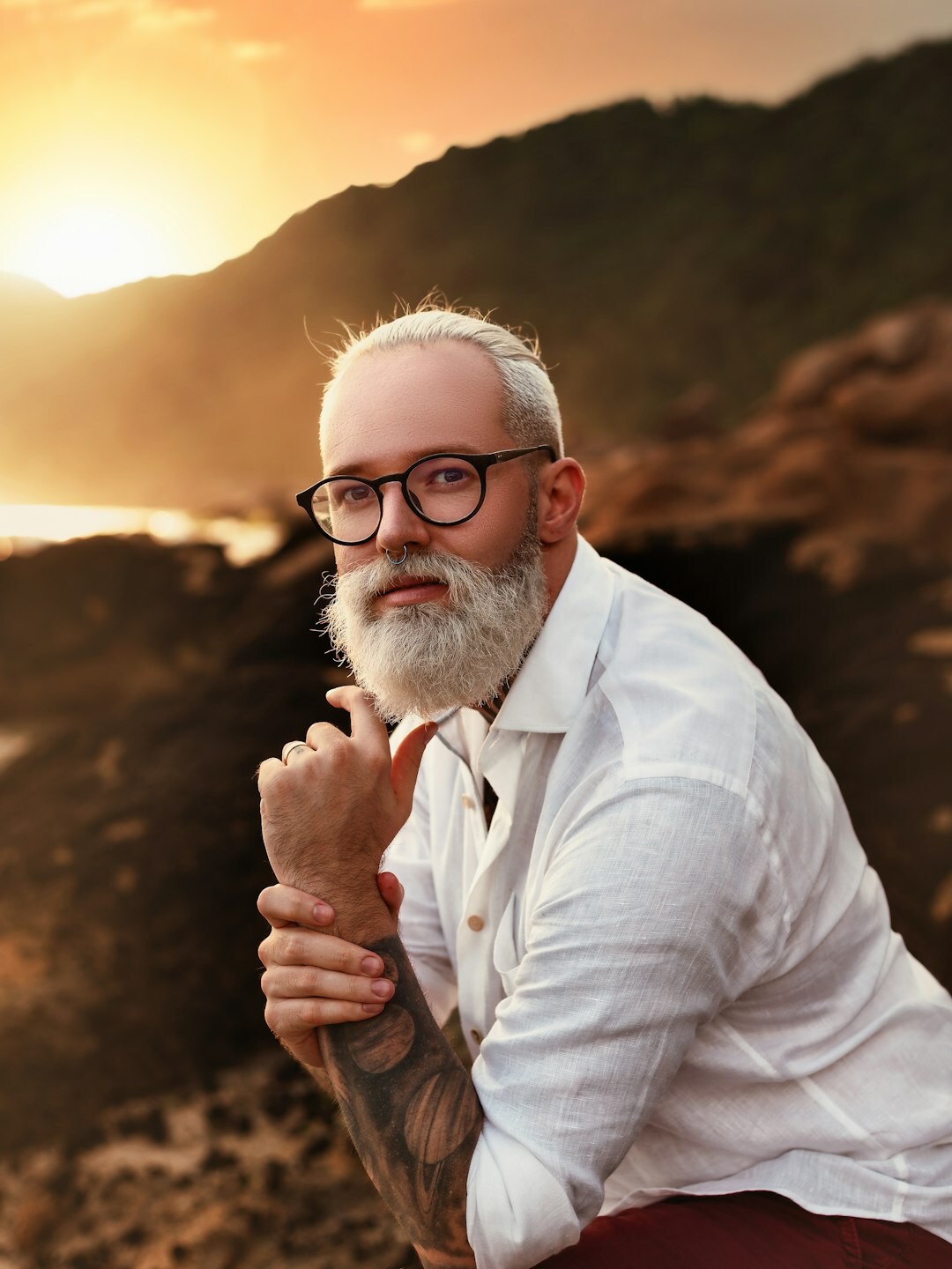 Studio portrait of a Swiss man in his fifties, senior editor