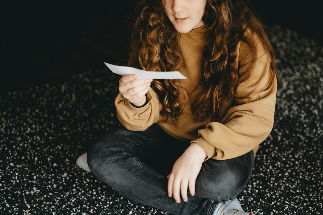 Swiss investigative journalist reviewing documents and files at a desk